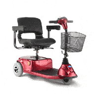 A red mobility scooter with a black cushioned seat, armrests, and a front basket. It has three wheels and handlebars for steering. The design is sleek and functional, suitable for indoor and outdoor use.
