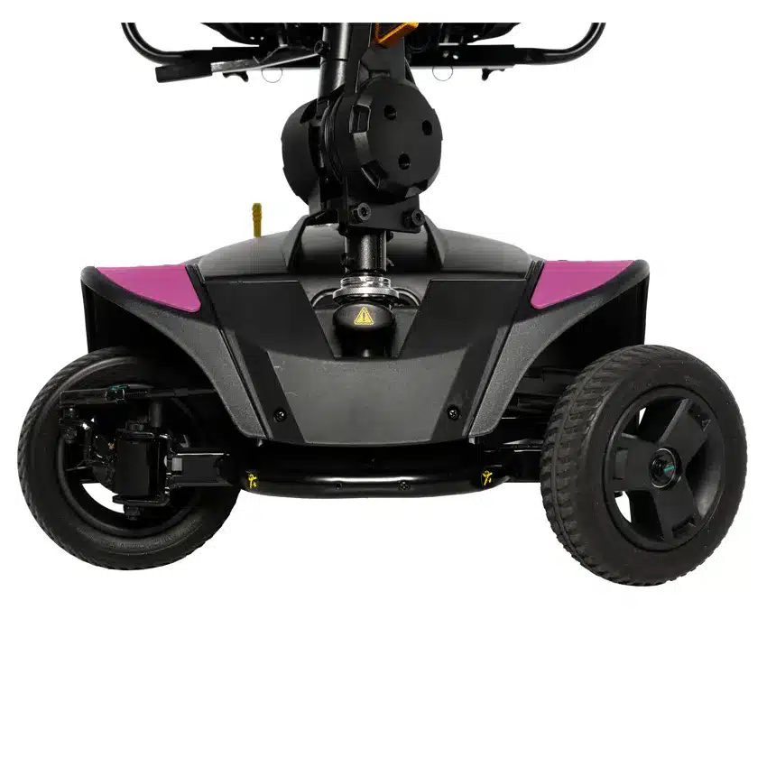 Front view of the base and two front wheels of a Go Go Elite Traveller 2 Platinum mobility scooter with magenta side panels.